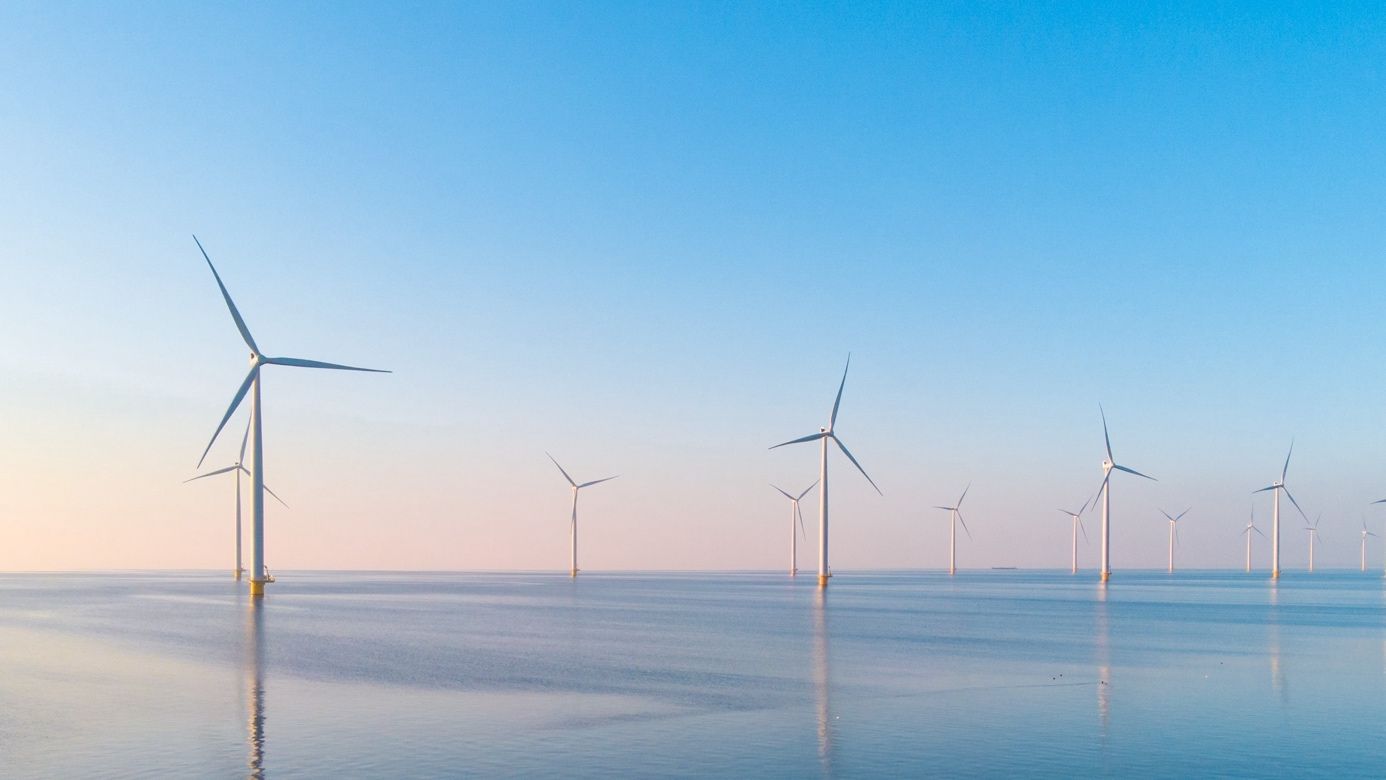 Afbeelding-met-windmolen-generator-hemel-apparaat0A0AAutomatisch-gegenereerde-beschrijving